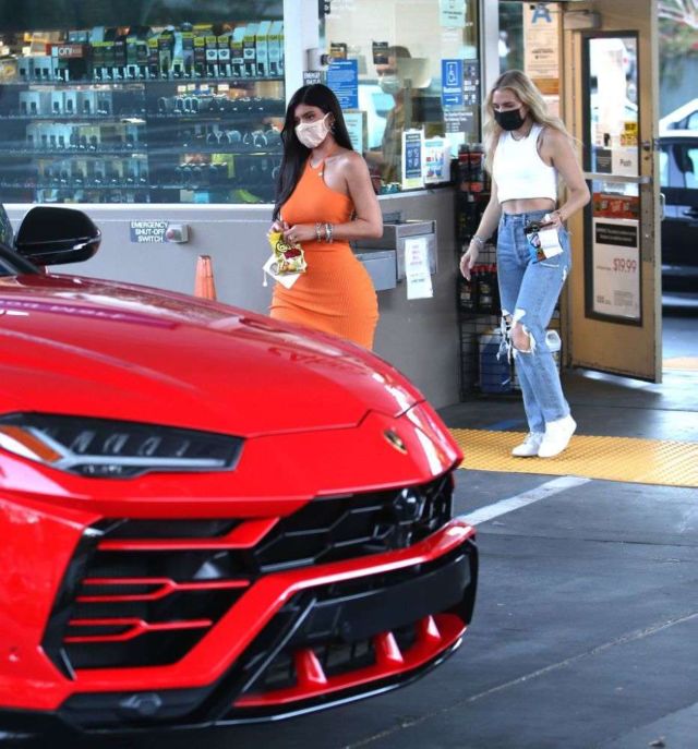 Kylie Jenner Looks Stunning In An Orange Dress At A Gas Station In Bel Air