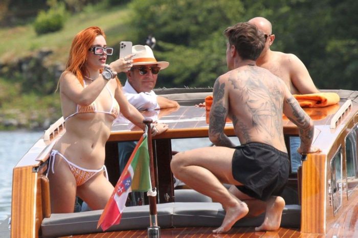 Bella Thorne Enjoying In Orange Bikini On Lake Como In Italy