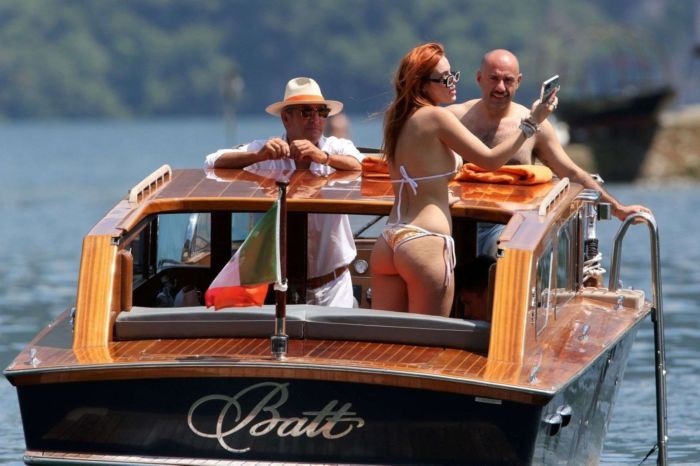 Bella Thorne Enjoying In Orange Bikini On Lake Como In Italy