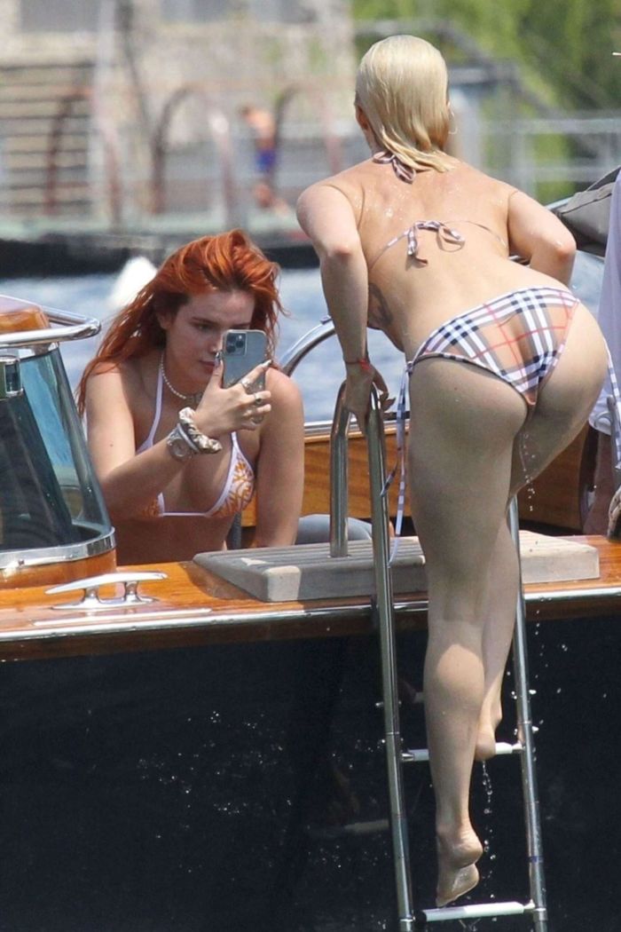 Bella Thorne Enjoying In Orange Bikini On Lake Como In Italy