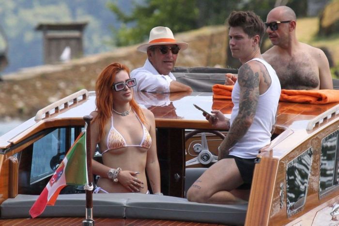 Bella Thorne Enjoying In Orange Bikini On Lake Como In Italy
