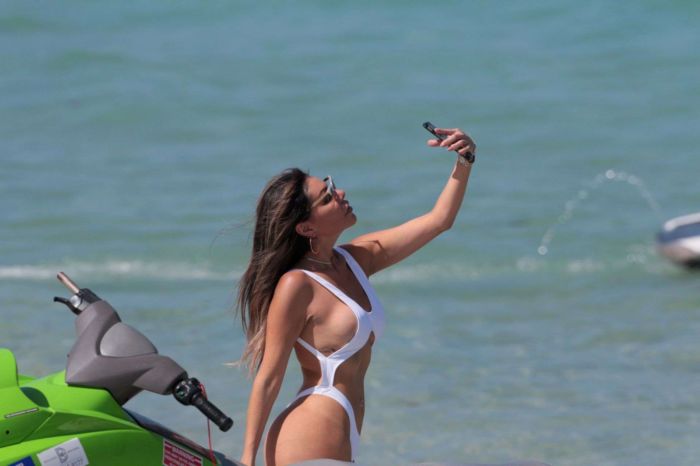 Liziane Gutierrez Hits The Beach In A White Swimsuit