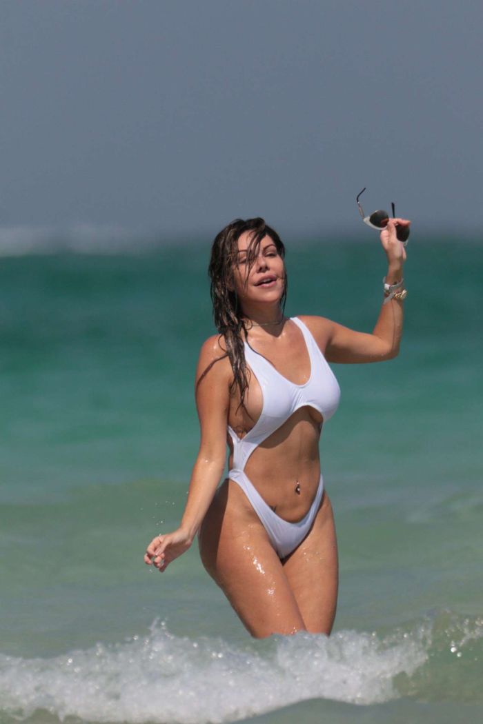 Liziane Gutierrez Hits The Beach In A White Swimsuit