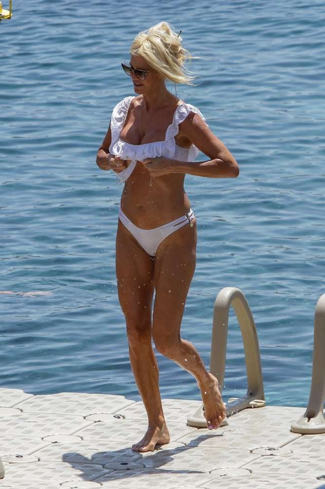 Victoria Silvstedt In A White Bikini On The Beach In Mykonos